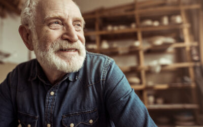 Portrait of senior potter at workshop